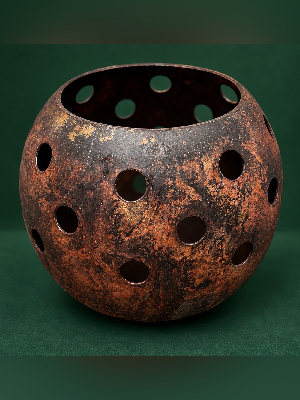 World Bazaars’ Rustic Metal Orb Candle Holder Pierced Sphere Decor
